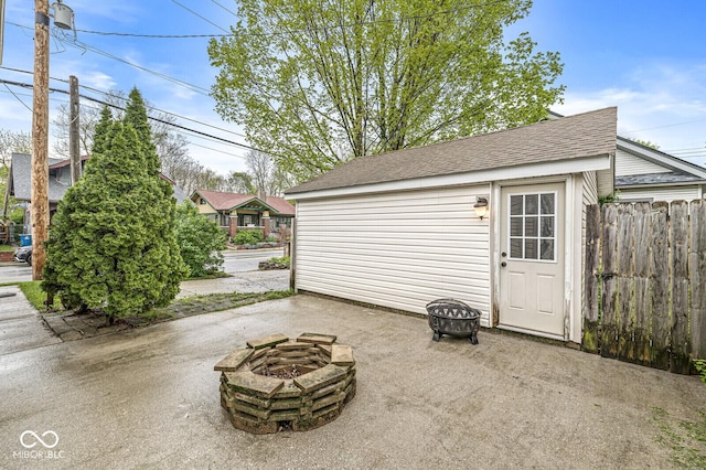 garage with fence