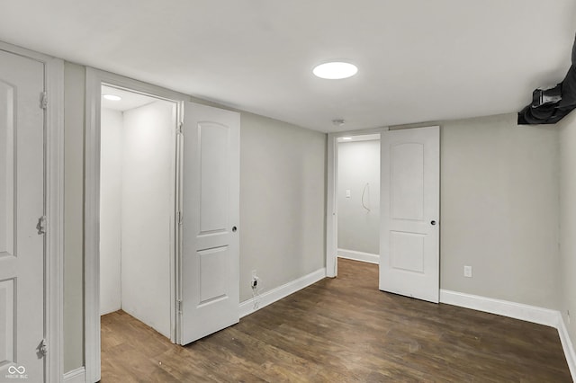 734 N Bradley Ave, Indianapolis, IN 46201 - unfurnished bedroom featuring wood finished floors and baseboards