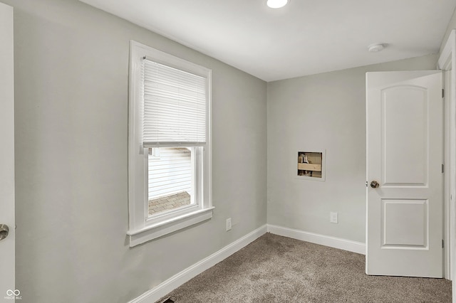 734 N Bradley Ave, Indianapolis, IN 46201 - empty room with baseboards and light colored carpet