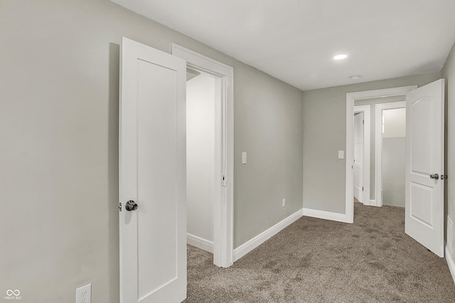 734 N Bradley Ave, Indianapolis, IN 46201 - unfurnished bedroom featuring carpet, baseboards, and recessed lighting