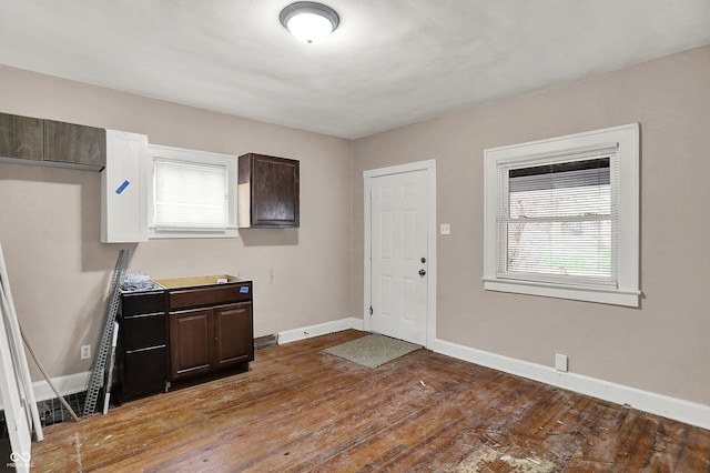 734 N Bradley Ave, Indianapolis, IN 46201 - foyer entrance with baseboards and dark wood finished floors