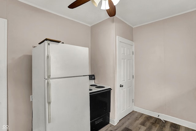 734 N Bradley Ave, Indianapolis, IN 46201 - kitchen with freestanding refrigerator, a ceiling fan, crown molding, wood finished floors, and electric range