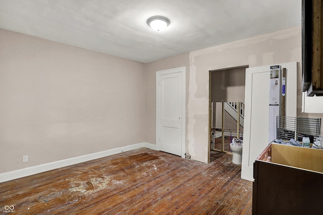 734 N Bradley Ave, Indianapolis, IN 46201 - interior space featuring baseboards and dark wood-type flooring