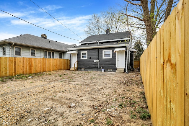 734 N Bradley Ave, Indianapolis, IN 46201 - rear view of property with entry steps and fence