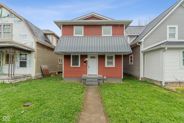 2935 Highland Pl, Indianapolis, IN 46208 - view of front of house featuring a front lawn and metal roof