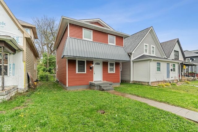 2935 Highland Pl, Indianapolis, IN 46208 - view of front of property with a front yard and metal roof