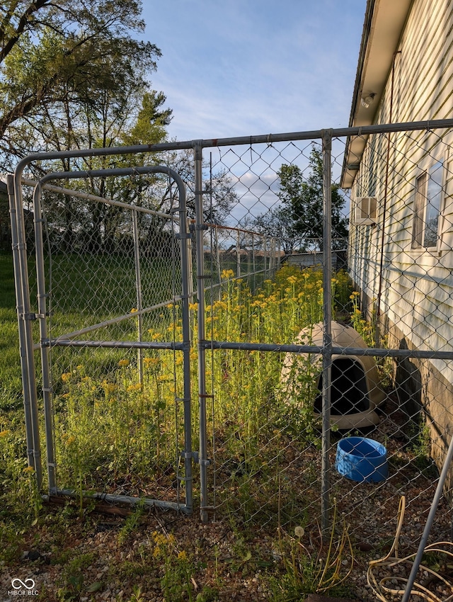 view of yard featuring a gate and fence