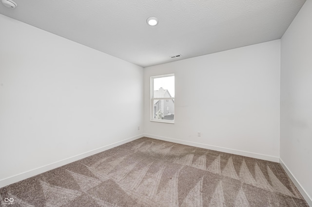 7265 Governors Row, Avon, IN 46123 - empty room with visible vents, carpet, and baseboards