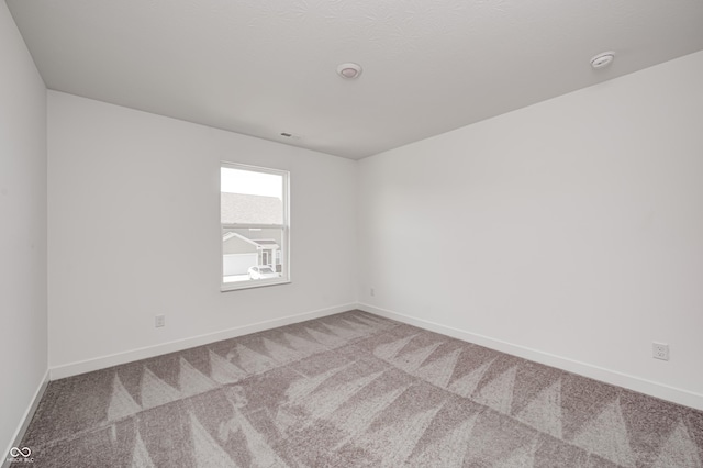 7265 Governors Row, Avon, IN 46123 - unfurnished room with baseboards and carpet floors