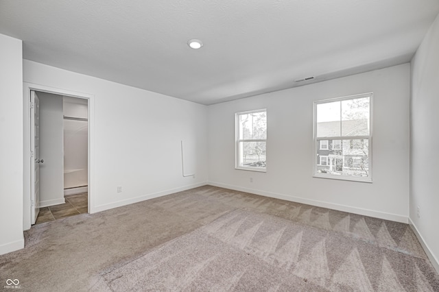 7265 Governors Row, Avon, IN 46123 - unfurnished bedroom featuring visible vents, recessed lighting, carpet flooring, and baseboards