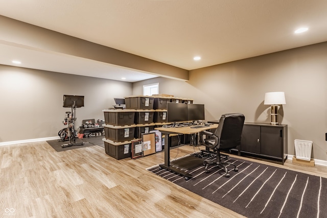 office with recessed lighting, baseboards, and light wood-style floors