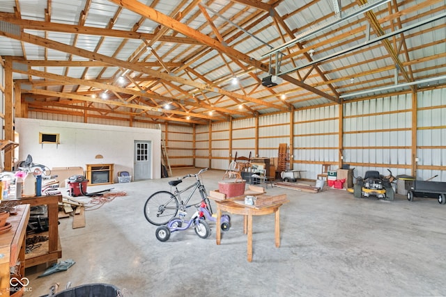1301 N Maple St, Veedersburg, IN 47987 - garage with a garage door opener and metal wall