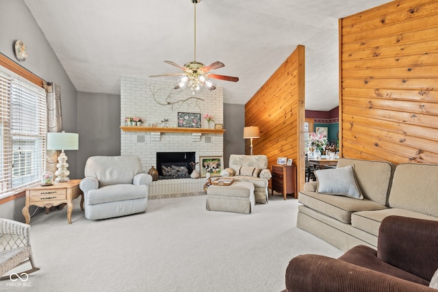 1301 N Maple St, Veedersburg, IN 47987 - living room featuring a ceiling fan, wood walls, carpet, a fireplace, and lofted ceiling