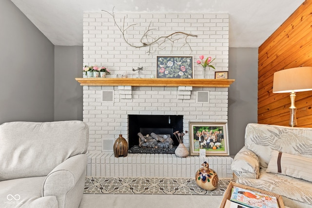 1301 N Maple St, Veedersburg, IN 47987 - living area featuring a brick fireplace and wooden walls