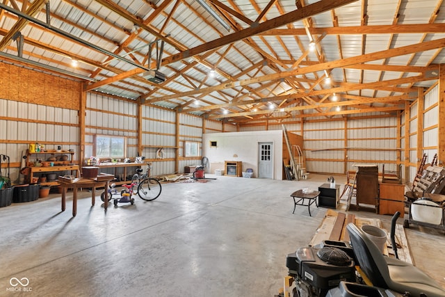 1301 N Maple St, Veedersburg, IN 47987 - garage featuring a garage door opener and metal wall
