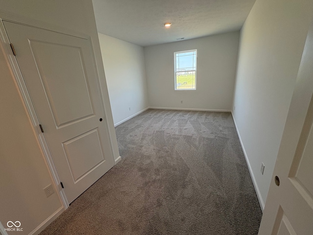 210 Aster Way, Greenfield, IN 46140 - carpeted empty room featuring baseboards