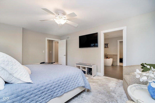 bedroom with ceiling fan, visible vents, and carpet