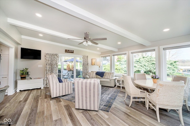 living area with recessed lighting, ceiling fan, light wood-type flooring, and lofted ceiling with beams