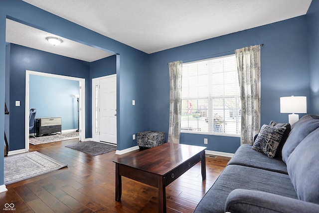 13836 Fieldcrest Dr, Mccordsville, IN 46055 - living area with hardwood / wood-style flooring and baseboards