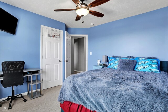 13836 Fieldcrest Dr, Mccordsville, IN 46055 - carpeted bedroom with baseboards and a ceiling fan