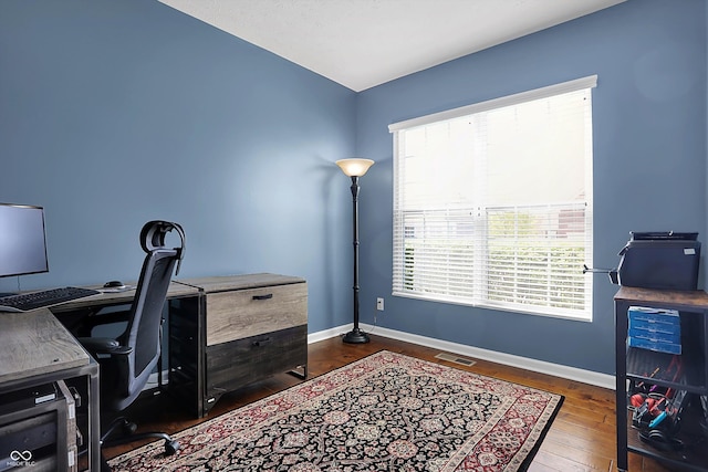 13836 Fieldcrest Dr, Mccordsville, IN 46055 - office area featuring visible vents, plenty of natural light, wood finished floors, and baseboards