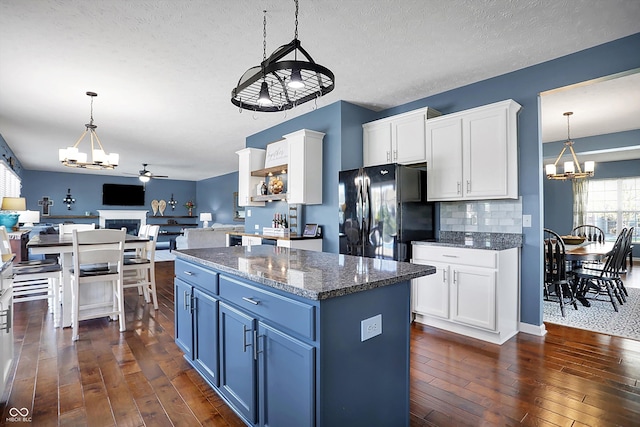13836 Fieldcrest Dr, Mccordsville, IN 46055 - kitchen featuring white cabinets, freestanding refrigerator, dark wood-style floors, and blue cabinets