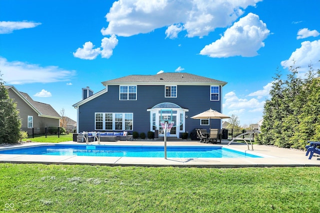 13836 Fieldcrest Dr, Mccordsville, IN 46055 - back of property with a lawn, fence, a fenced in pool, and an outdoor hangout area