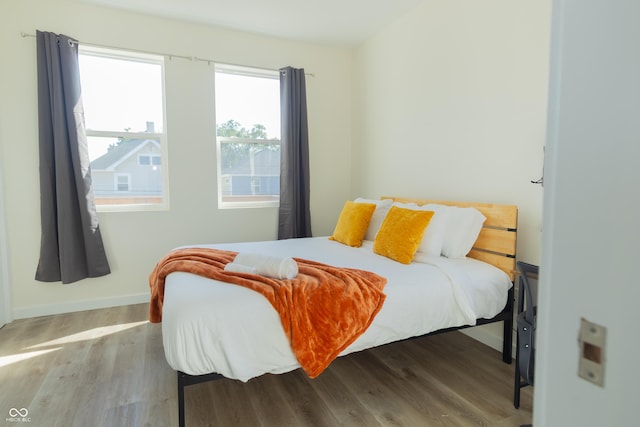2302 Prospect St, Indianapolis, IN 46203 - bedroom with baseboards and wood finished floors
