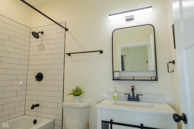 2302 Prospect St, Indianapolis, IN 46203 - bathroom featuring tub / shower combination, toilet, and vanity