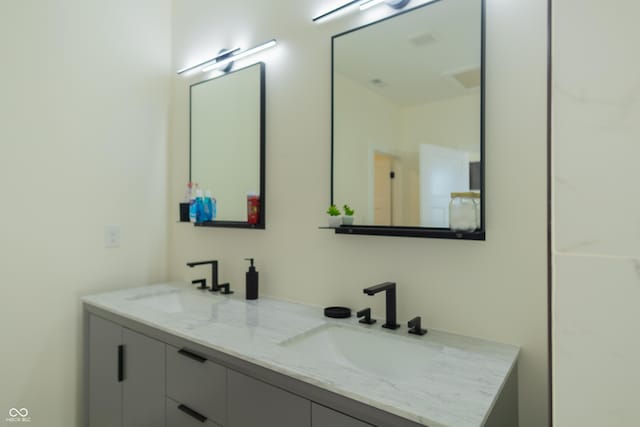2302 Prospect St, Indianapolis, IN 46203 - full bath with a sink and double vanity