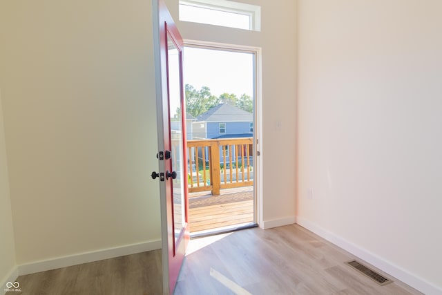 2302 Prospect St, Indianapolis, IN 46203 - entryway featuring baseboards, visible vents, and light wood-type flooring