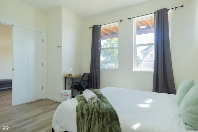 2302 Prospect St, Indianapolis, IN 46203 - bedroom featuring light wood finished floors and baseboards