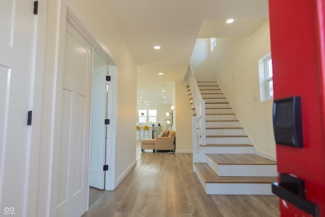 2302 Prospect St, Indianapolis, IN 46203 - entryway featuring wood finished floors, a healthy amount of sunlight, and stairway