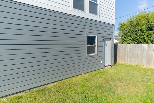 2302 Prospect St, Indianapolis, IN 46203 - view of property exterior featuring fence and a yard