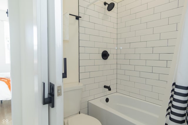 2302 Prospect St, Indianapolis, IN 46203 - full bathroom with shower / bathtub combination with curtain and toilet