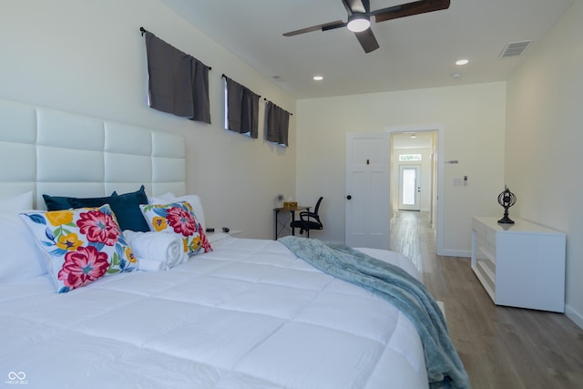 2302 Prospect St, Indianapolis, IN 46203 - bedroom with recessed lighting, wood finished floors, visible vents, a ceiling fan, and baseboards