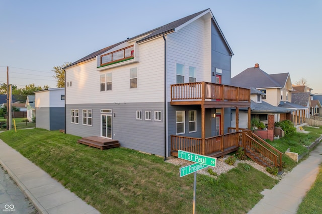 2302 Prospect St, Indianapolis, IN 46203 - exterior space with a lawn and a balcony