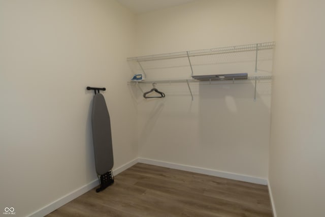 2302 Prospect St, Indianapolis, IN 46203 - spacious closet with wood finished floors
