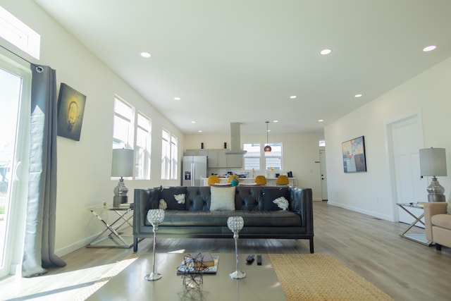 2302 Prospect St, Indianapolis, IN 46203 - living area with baseboards, light wood-style floors, and recessed lighting