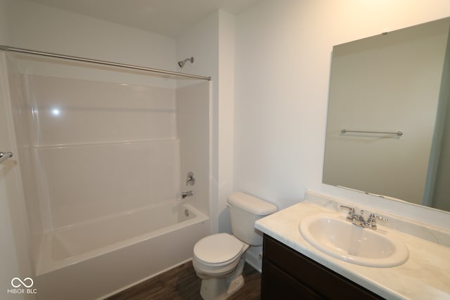 3832 Highcrest Rd, Indianapolis, IN 46239 - bathroom featuring toilet, vanity, bathing tub / shower combination, and wood finished floors