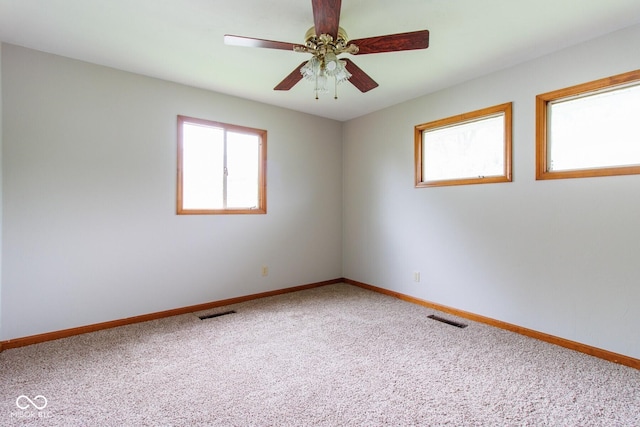 4917 Algonquin Trl, Kokomo, IN 46902 - carpeted empty room featuring baseboards and ceiling fan