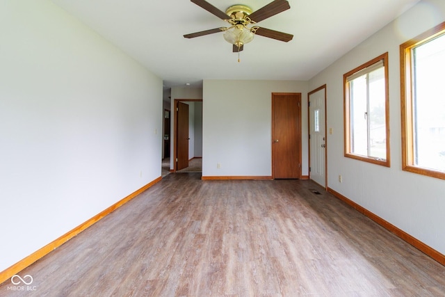 4917 Algonquin Trl, Kokomo, IN 46902 - unfurnished room featuring light wood-type flooring, baseboards, and ceiling fan