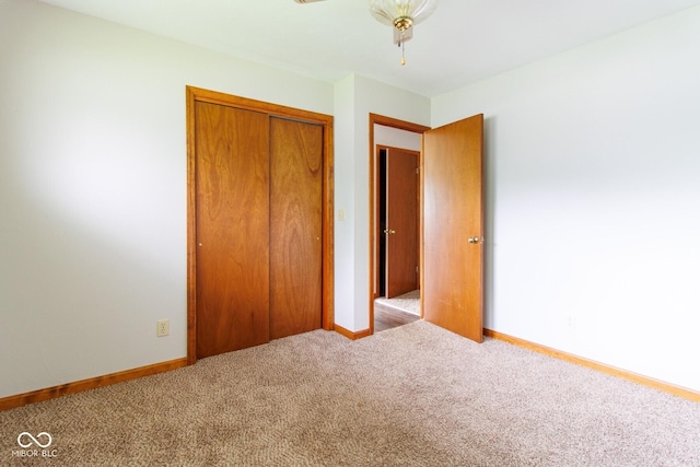 4917 Algonquin Trl, Kokomo, IN 46902 - unfurnished bedroom with carpet flooring, a closet, and baseboards