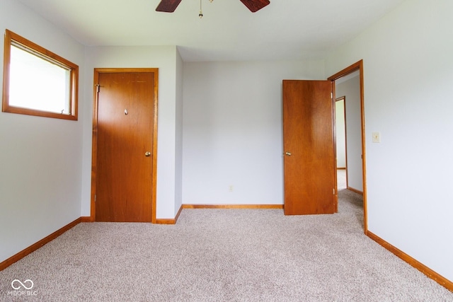 4917 Algonquin Trl, Kokomo, IN 46902 - carpeted empty room with ceiling fan and baseboards