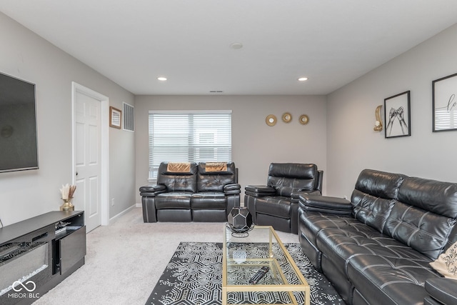 carpeted living area with baseboards, visible vents, and recessed lighting