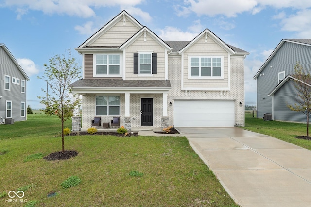 craftsman-style home featuring covered porch, brick siding, driveway, a front yard, and an attached garage