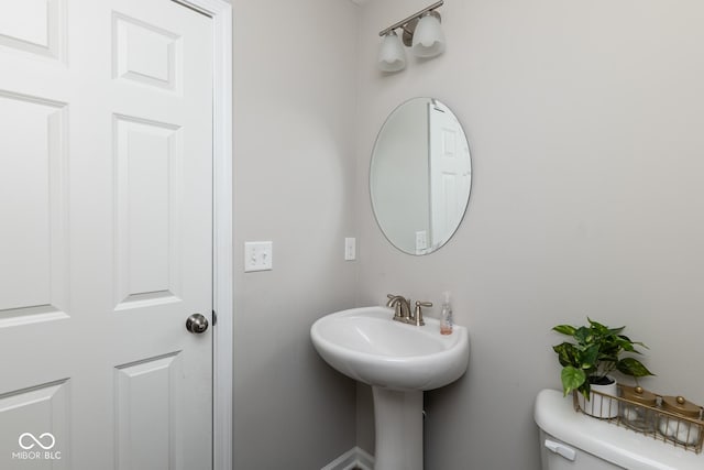 bathroom featuring toilet