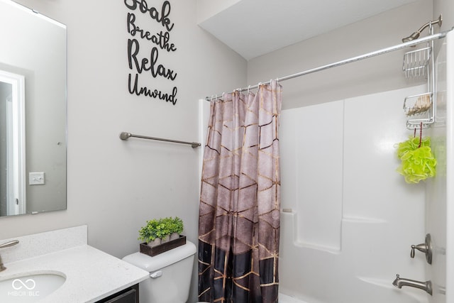 full bathroom with shower / tub combo, toilet, and vanity