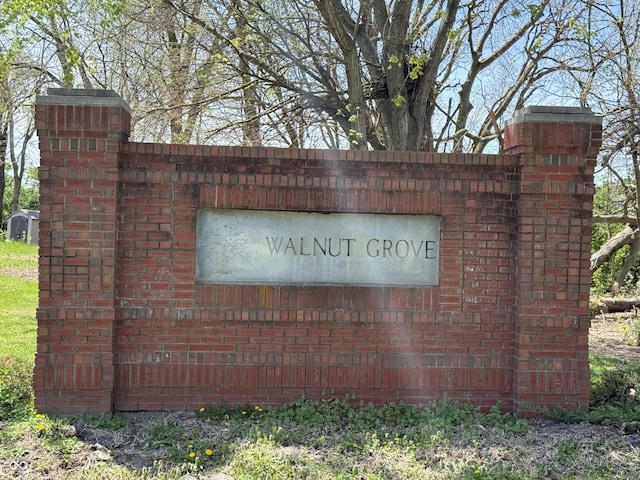 view of community sign