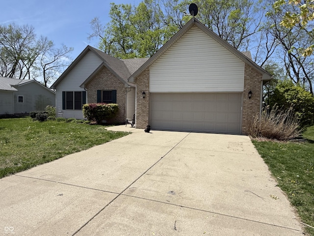 single story home with concrete driveway, an attached garage, brick siding, and a front yard